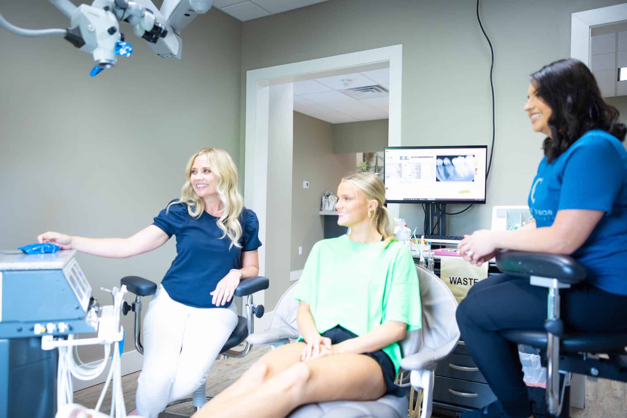 Endodontist, Dr. Toole With Patient At NWA Endodontic Specialists in Bentonville & Fayetteville, AR