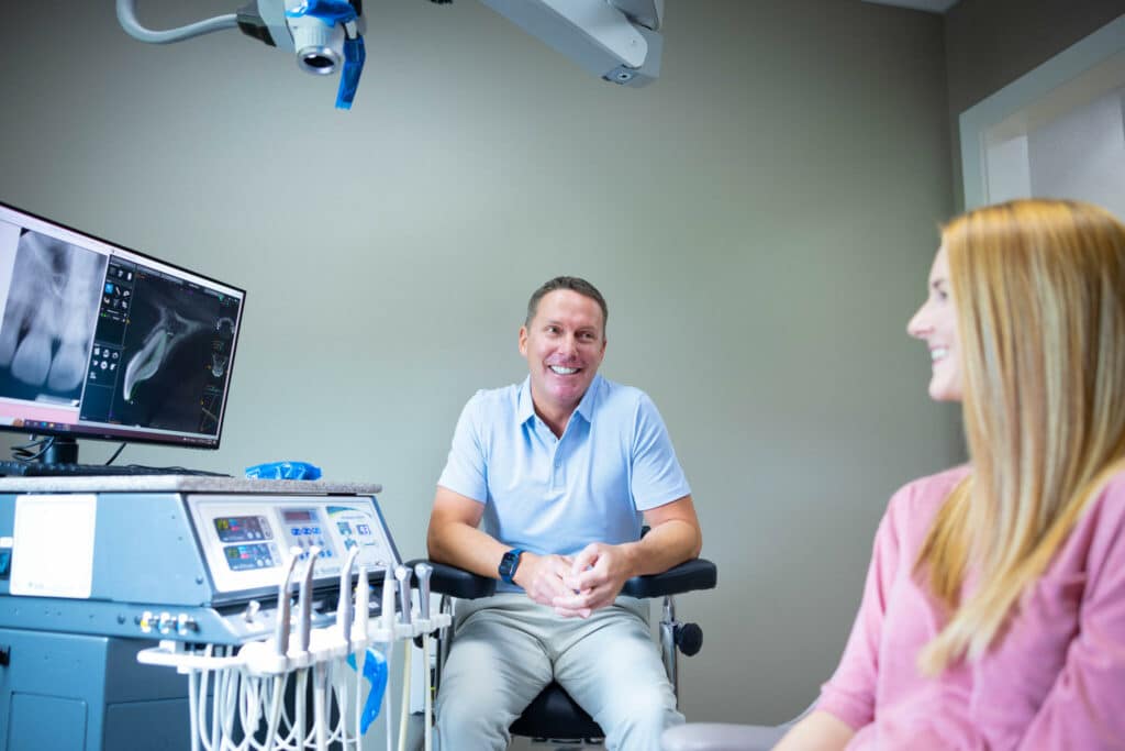 Endodontist, Dr. Behrents With Patient At NWA Endodontic Specialists in Bentonville & Fayetteville, AR