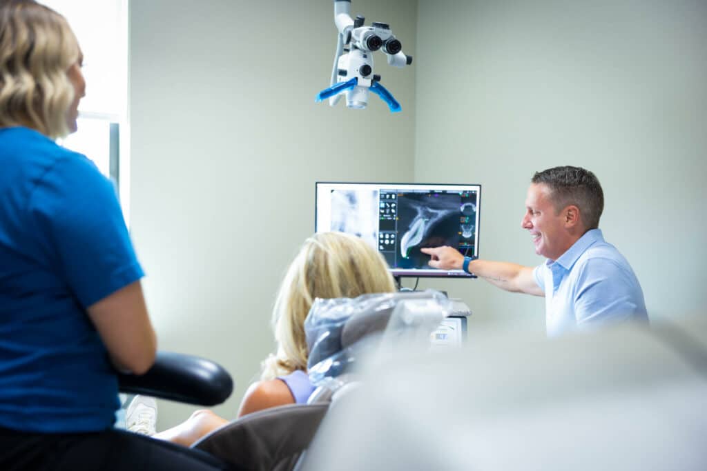 Endodontist Dr. Behrents with patient - NWA Endodontic Specialists - Bentonville & Fayetteville, AR