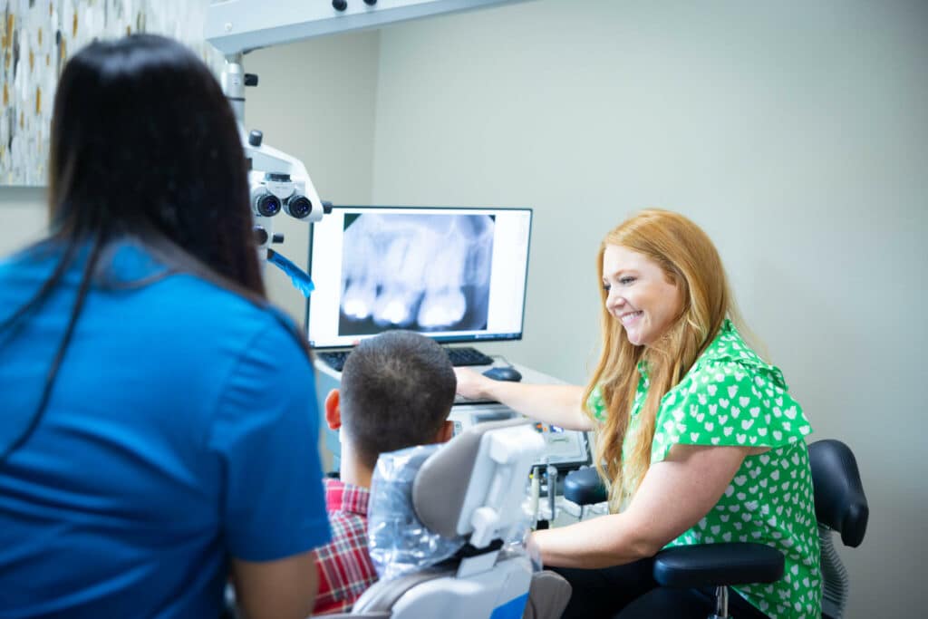 Endodontist Dr. Townsend with patient - NWA Endodontic Specialists - Bentonville & Fayetteville, AR